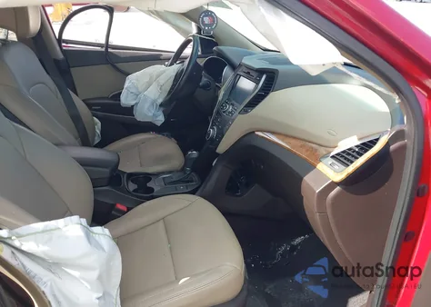 2015 Hyundai Santa Fe Sport 2.4L z USA, uszkodzony, nr VIN 5XYZUDLB0FG291926